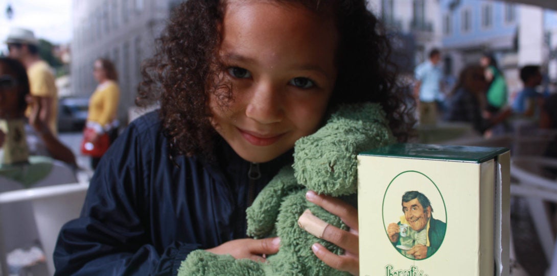 Katie with green teddy bear